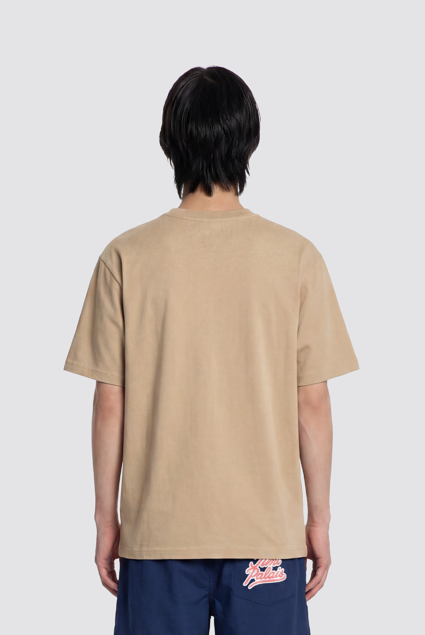 Beiges T Shirt mit Brusttasche, Reißverschluss und J Monogramm