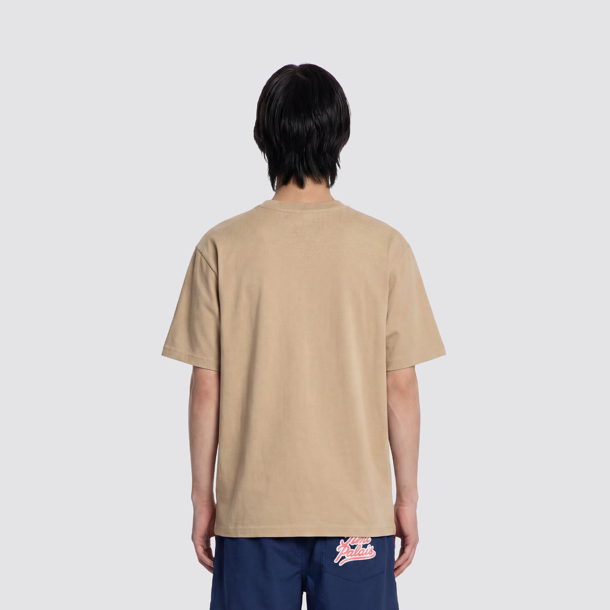 Beiges T Shirt mit Brusttasche, Reißverschluss und J Monogramm