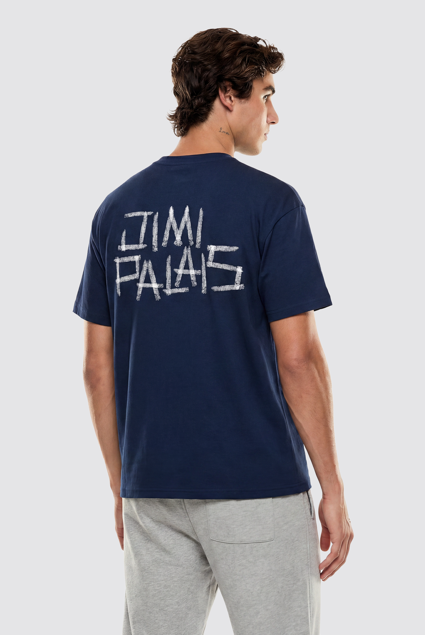 T-Shirt mit Reifenspuren-Backprint, JIMI PALAIS Textmotiv auf Rücken und Brust sowie Patch-Label auf der Vorderseite