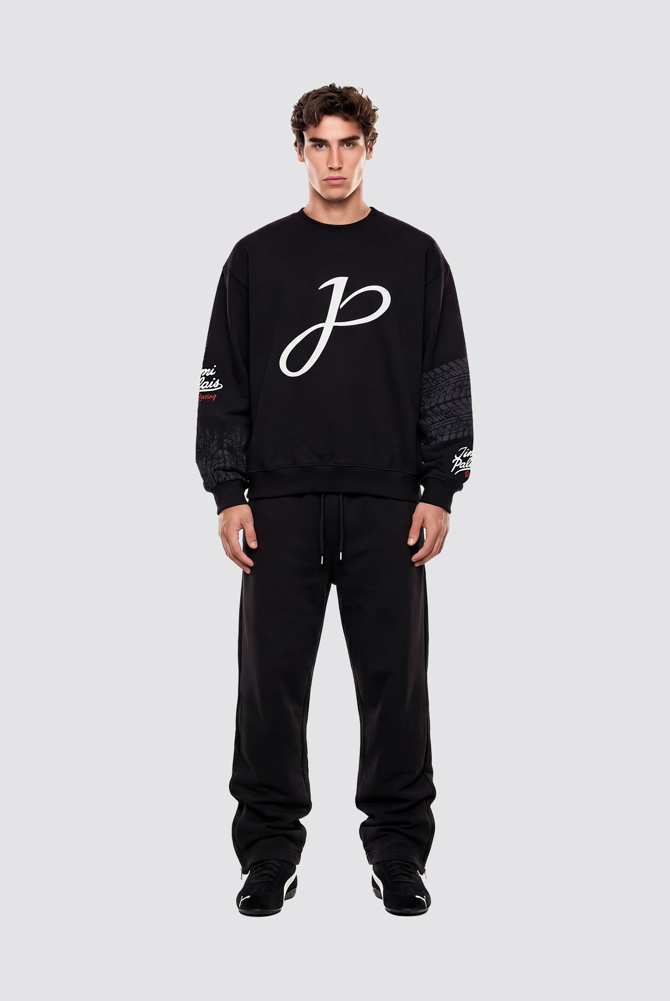 Schwarzer Baumwollpullover mit Applikationen und Frontprint auf der Vorderseite