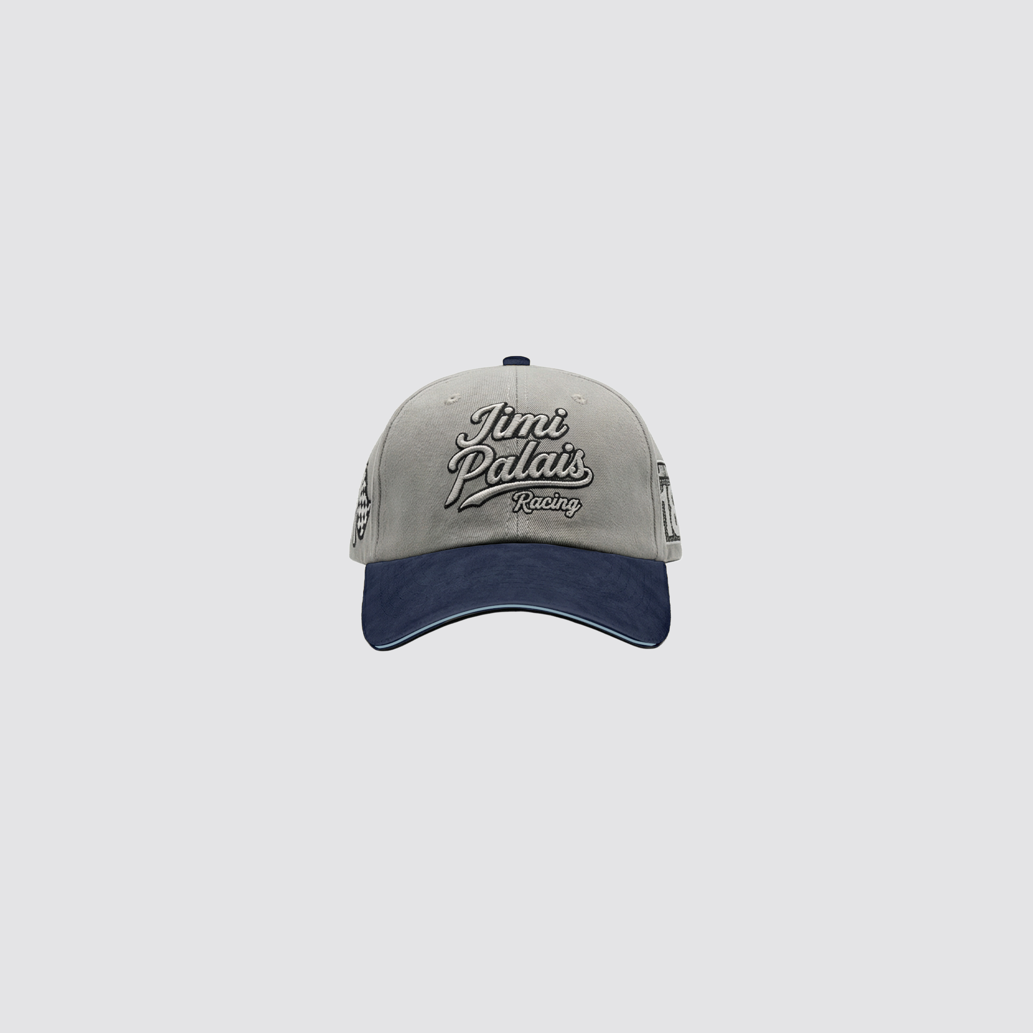 Graue Cap mit navy Schirm und gestickten Applikationen auf der Vorderseite