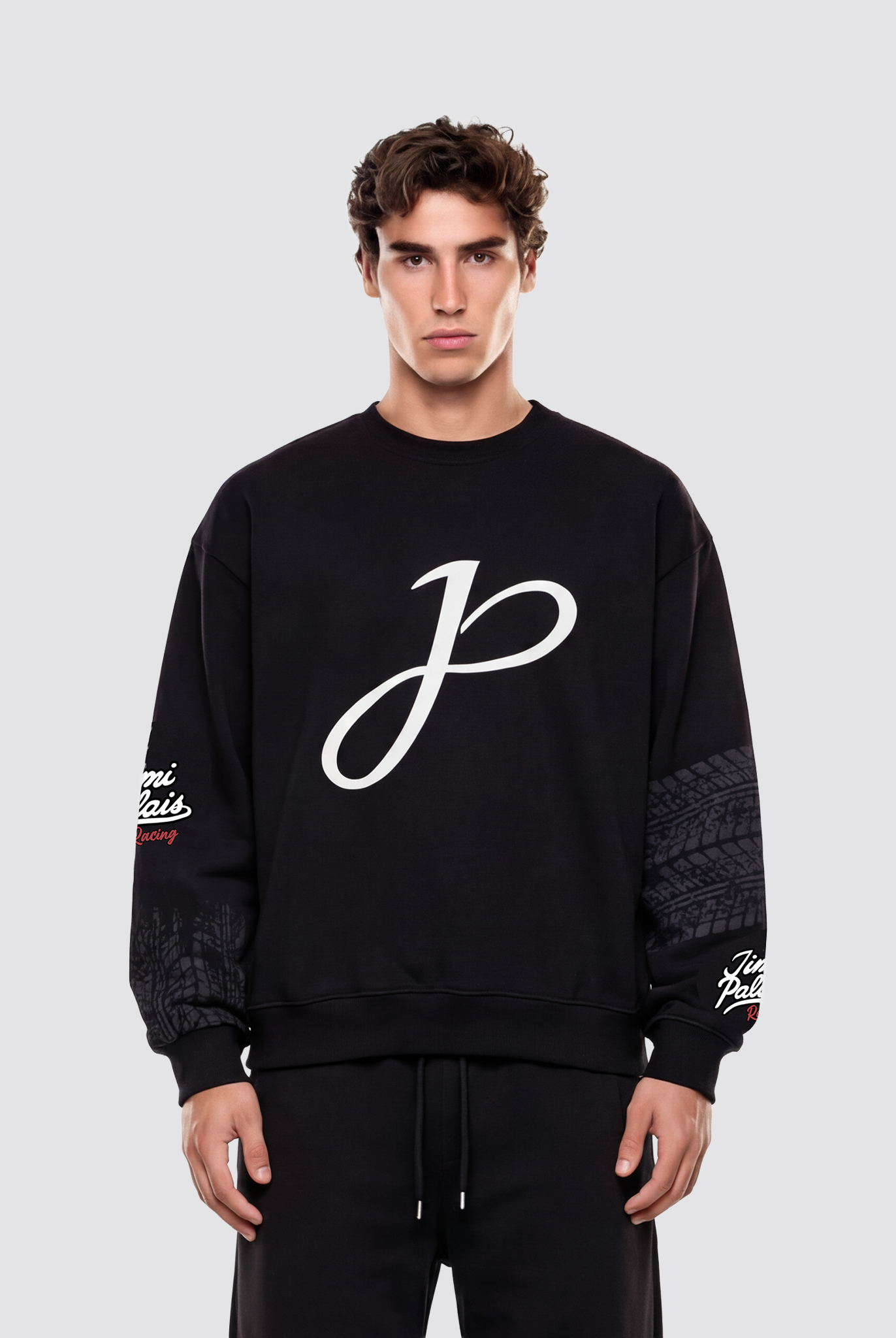 Schwarzer Baumwollpullover mit Applikationen und Frontprint auf der Vorderseite