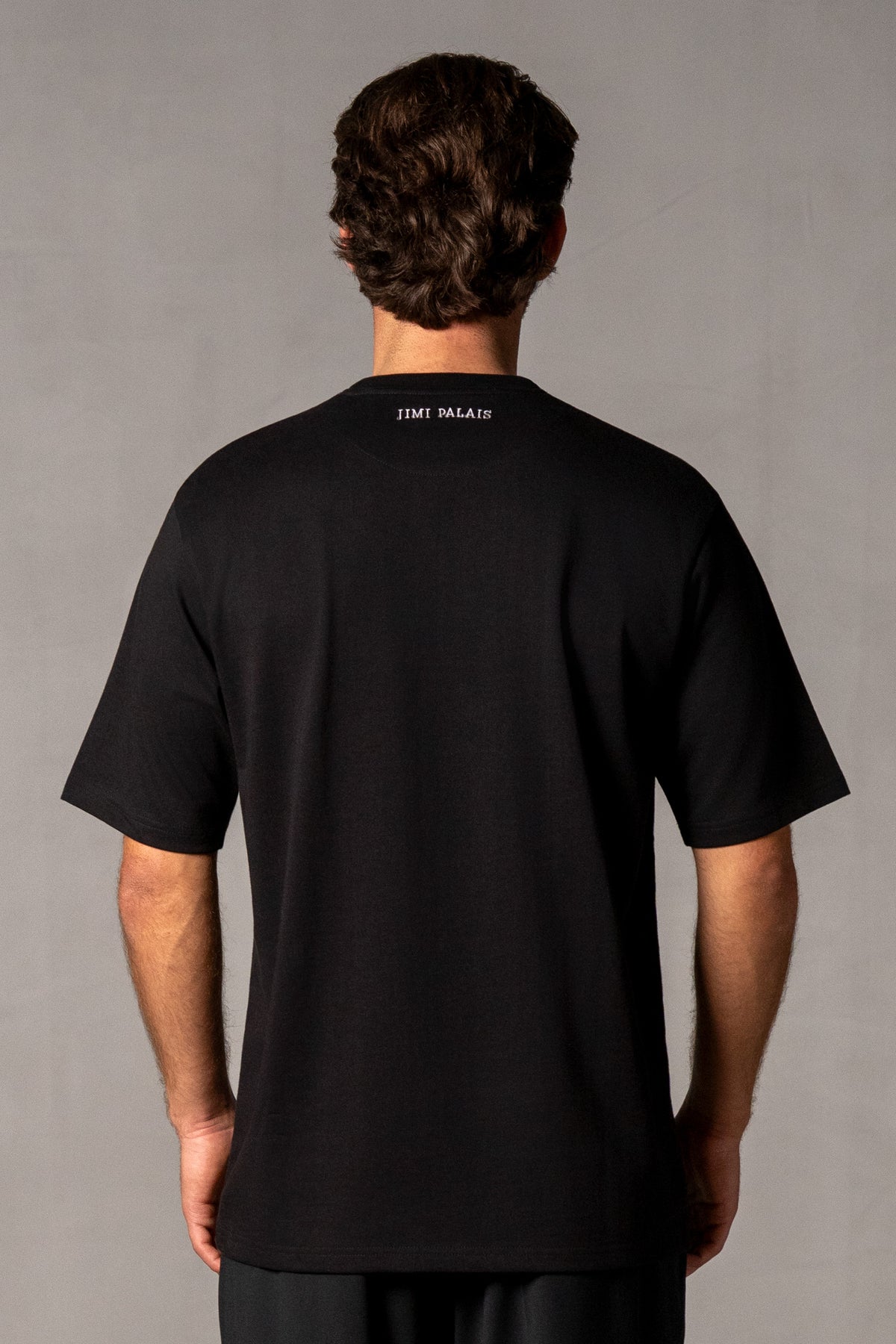 Herren T-Shirt mit JIMI PALAIS Monogramm – Schwarz, Rückansicht