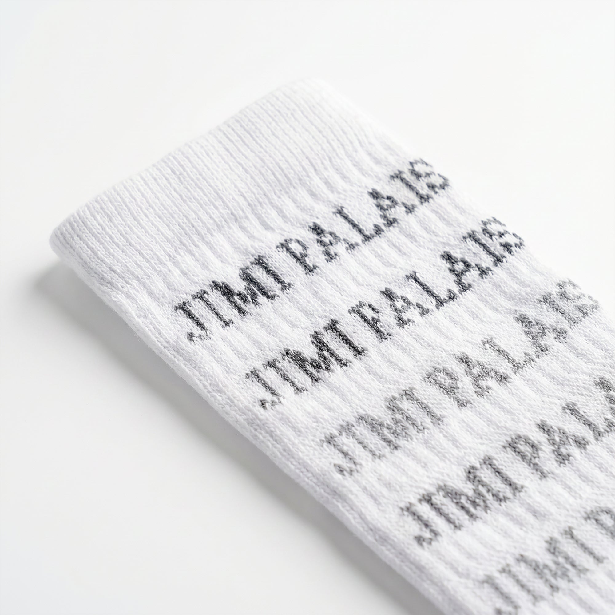 Socken mit JIMI PALAIS Schriftzug und Gummiband 