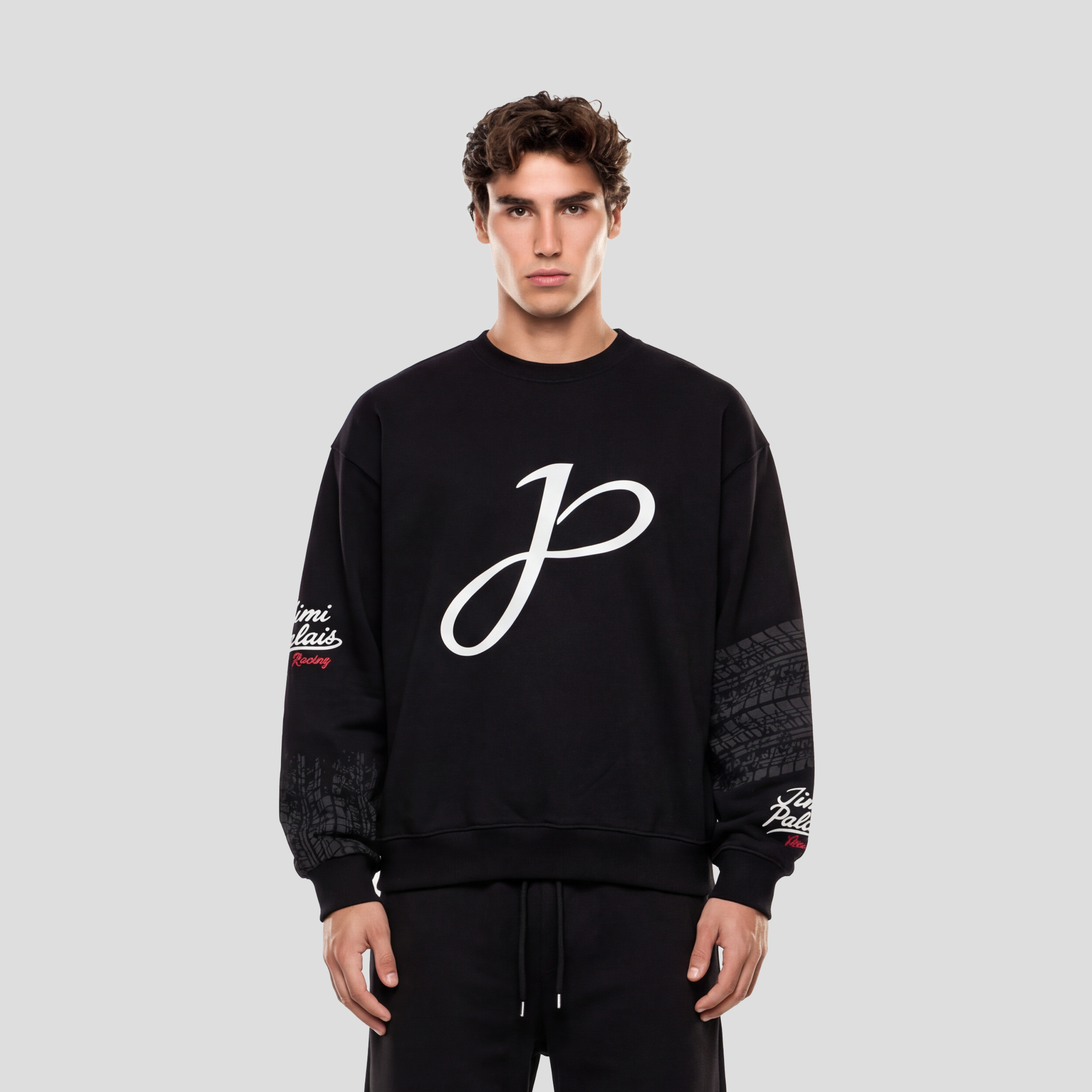 Schwarzer Baumwollpullover mit Applikationen und Frontprint auf der Vorderseite