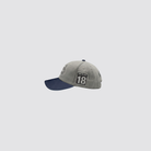 Cap mit detailreicher Stickerei und Patch auf der linken Seite