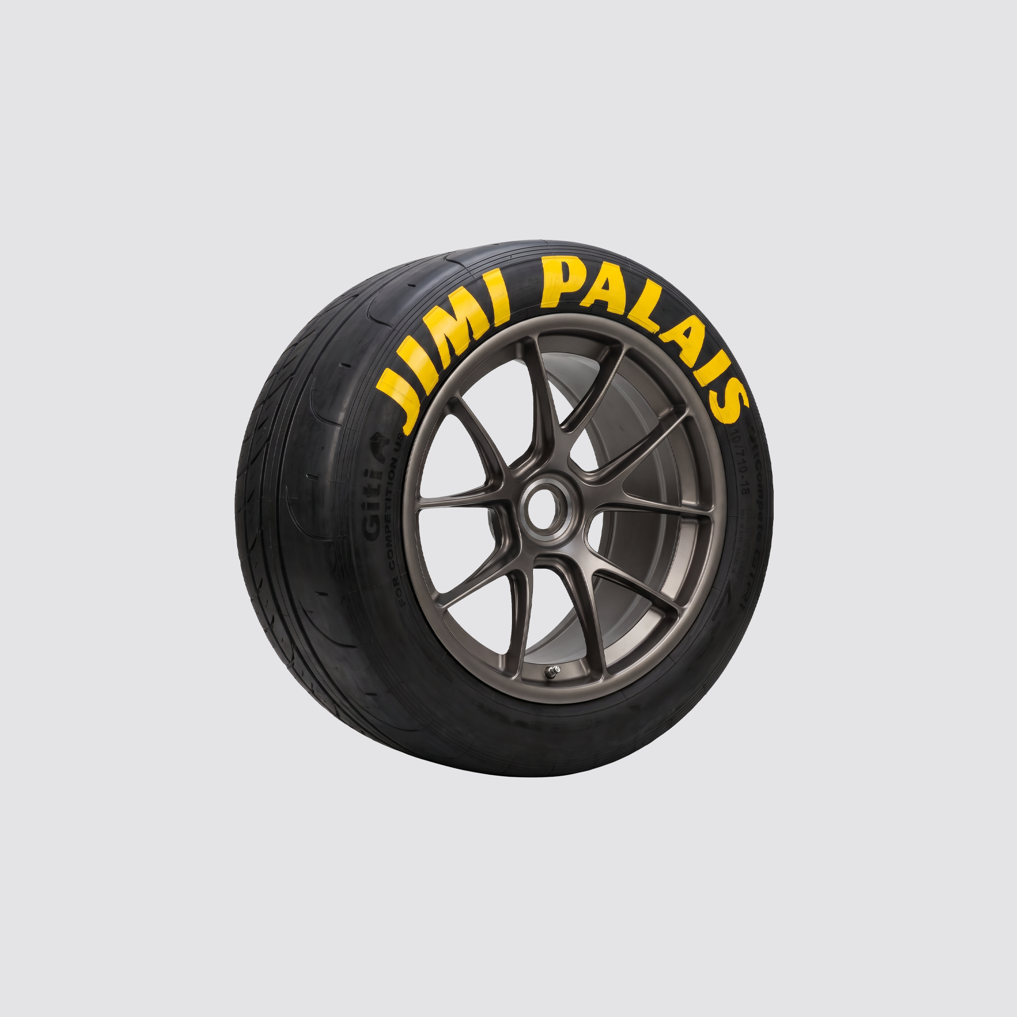 JIMI PALAIS 992 GT3 Cup Reifen mit gelbem Logo als Designobjekt für Interior und Motorsport Liebhaber